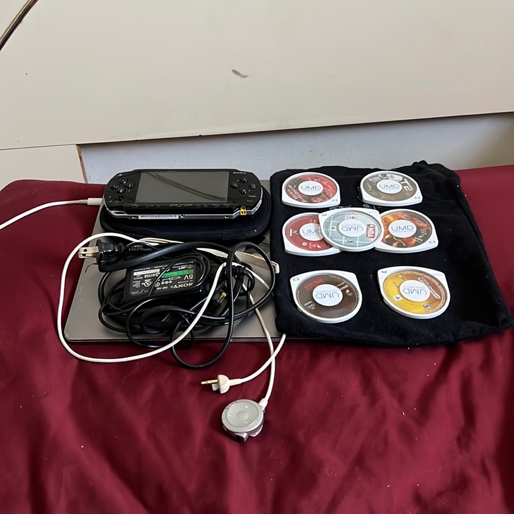 Hand held PSP in Great condition!!!!! Extra 5 movies 2 games Great Deal.